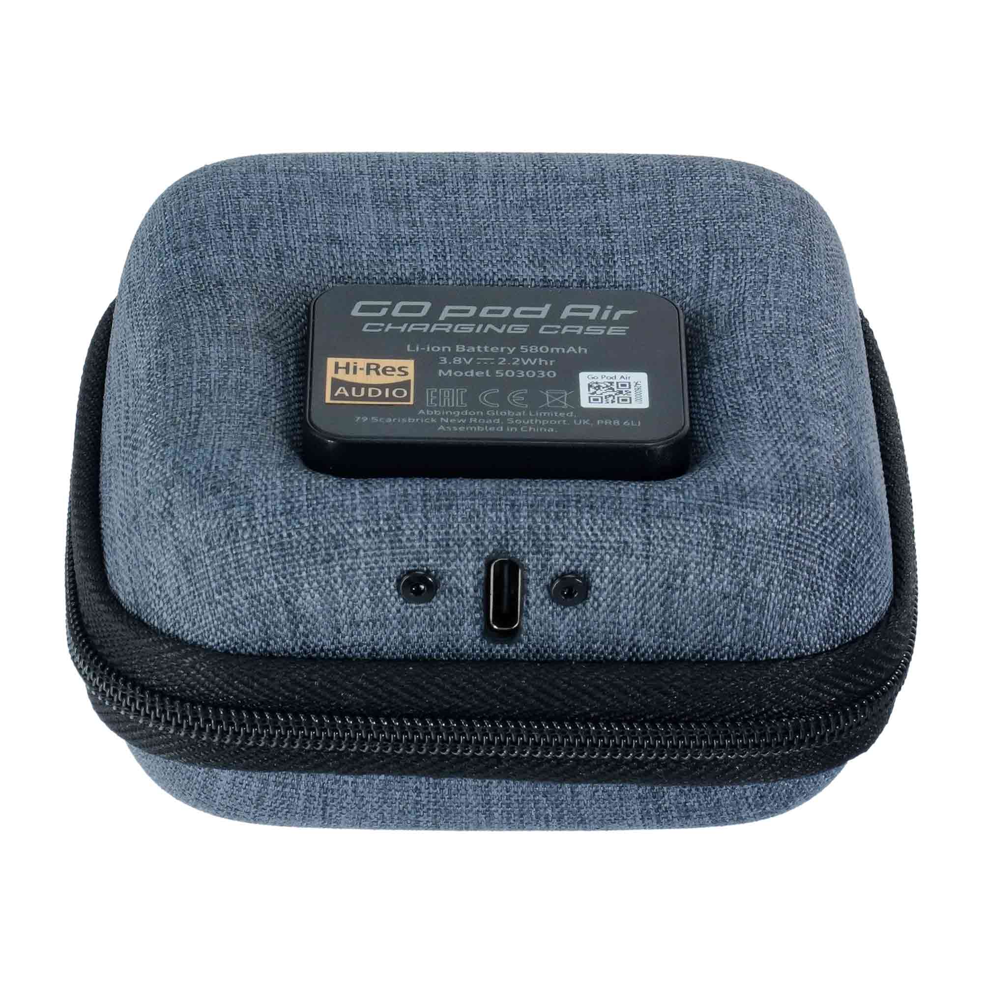 iFi Audio GO Pod Air Wearable Bluetooth DAC/Amp charging case with USB-C port on textured gray fabric background