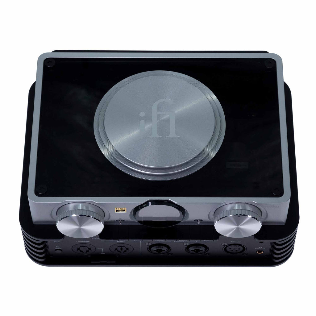 Top view of iFi Audio iCAN Phantom Premium Headphone Amplifier with silver dials and brushed metal center on black base