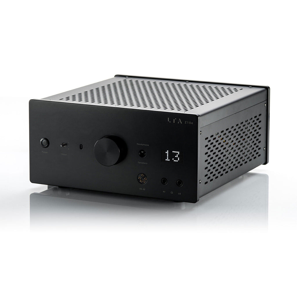 LTA Z10e Electrostatic Vacuum Tube Headphone / Integrated Amp showing front panel with volume knob and display on white surface
