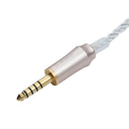 Close-up of the gold 4.4 balanced connector on the Meze 99 Series Silver Plated Cable with clear braided wire