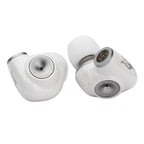 Close-up of silver Meze ALBA In-Ear Monitors showing nozzles and connector pins on white background