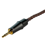 Close-up of the Meze Empyrean/Elite Copper Upgrade Cable with braided copper wire and gold-plated 3.5mm connector