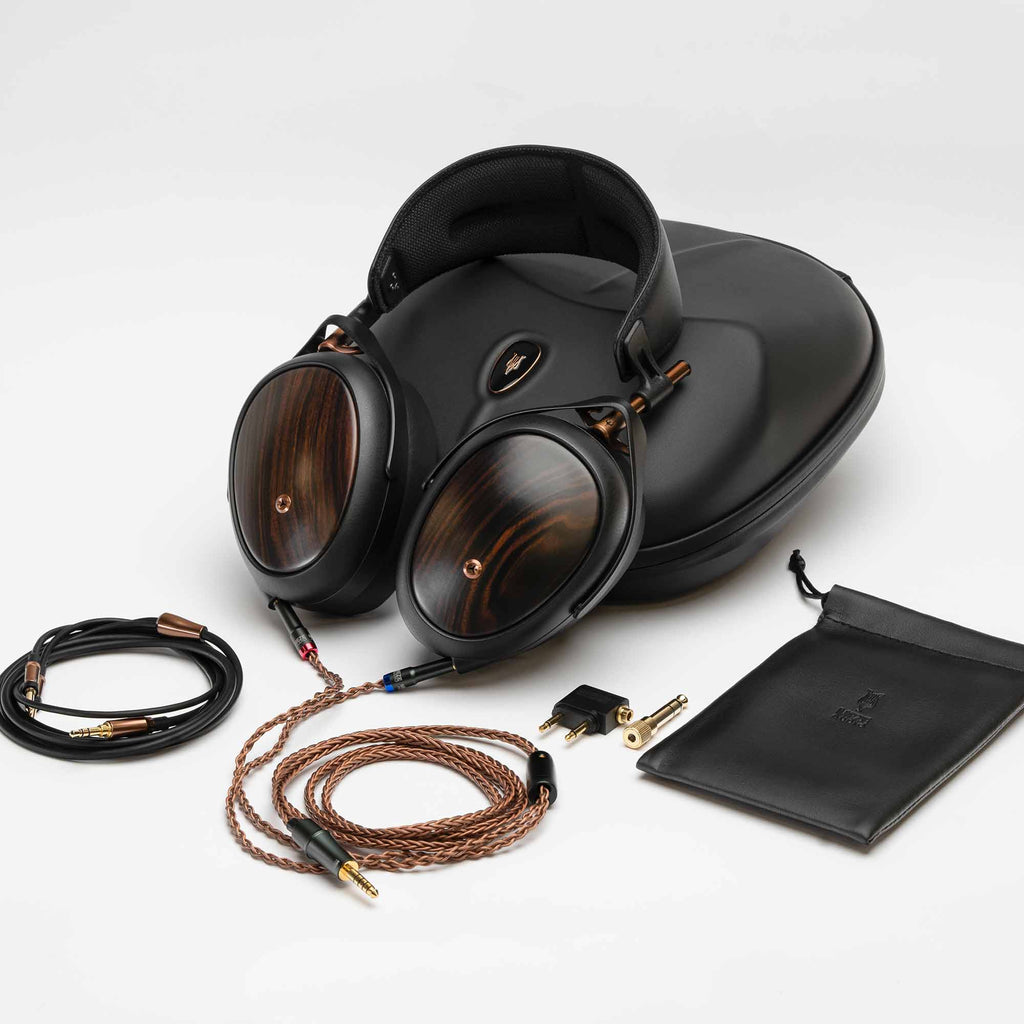 Meze LIRIC II Closed-Back Headphone with wood earcups, braided cables, carrying case, and accessory pouch on white background