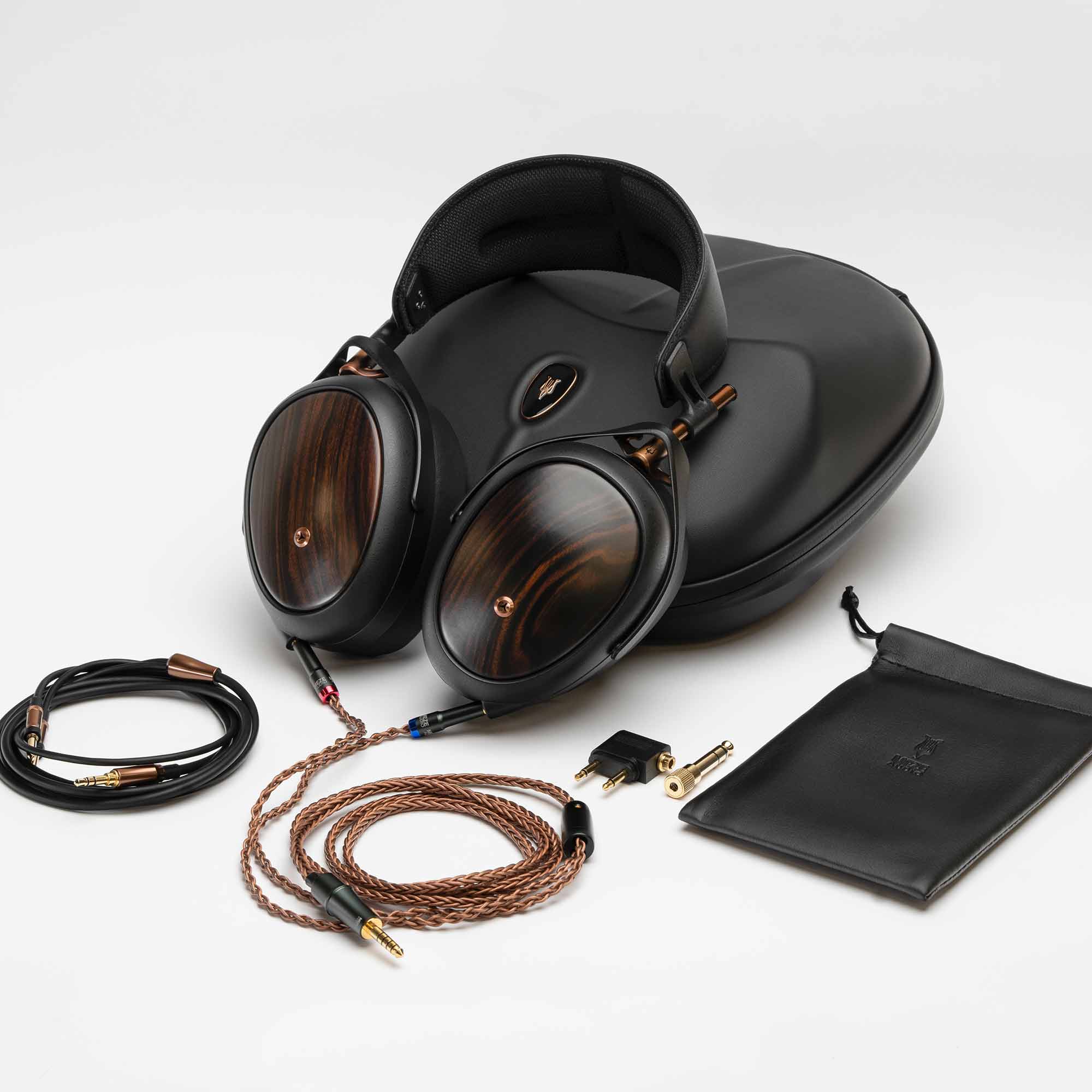 Meze LIRIC II Closed-Back Headphone with wood earcups, braided cables, carrying case, and accessory pouch on white background