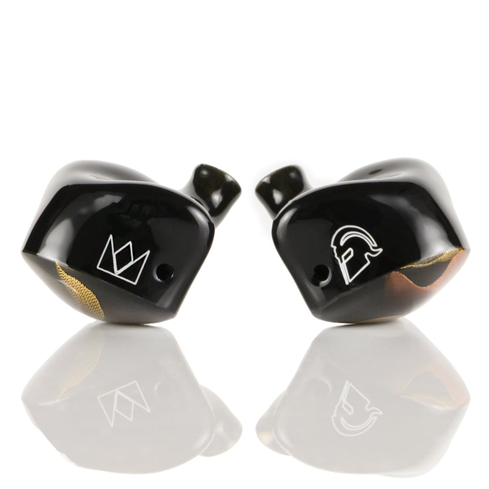 Noble Audio Agis II IEM black in-ear monitors with custom logo designs on glossy shells reflecting on white surface