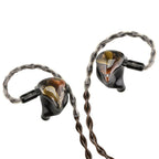 Noble Audio Agis II IEM with black custom-fit shells and braided detachable cables on white background