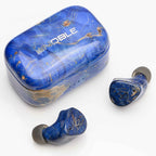 Noble Audio FoKus Prestige Wireless IEM with blue and gold marbled charging case and matching wireless earbuds on white background