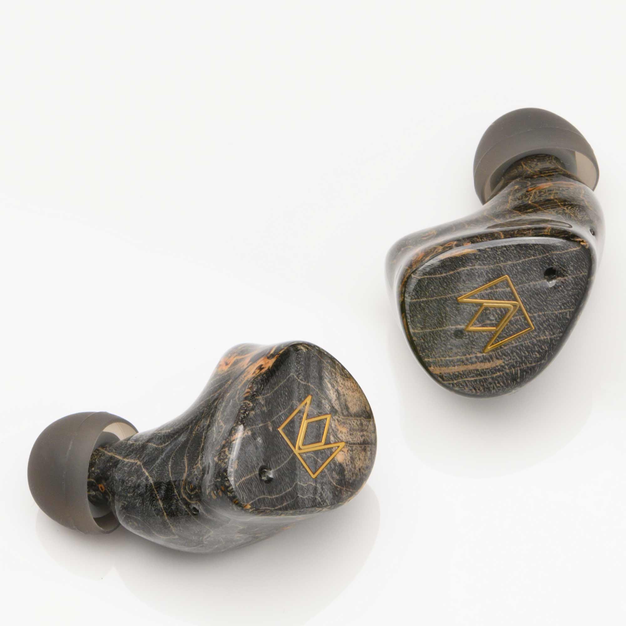 Noble Audio FoKus Prestige Wireless IEM in dark wood finish with gold logo and black silicone ear tips on white background