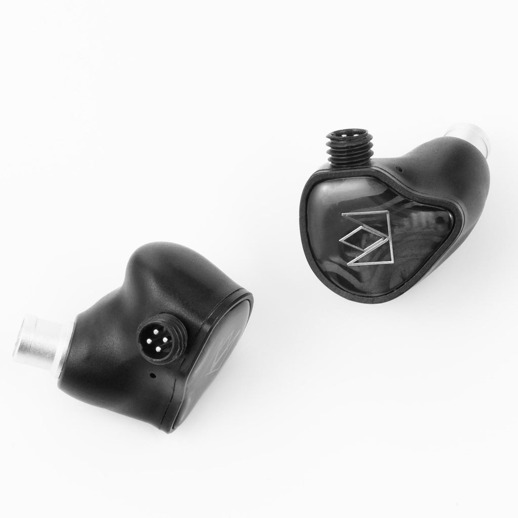 Noble Audio XM-1 IEM with xMEMS Driver showing black earphone shells with detachable connectors on white background