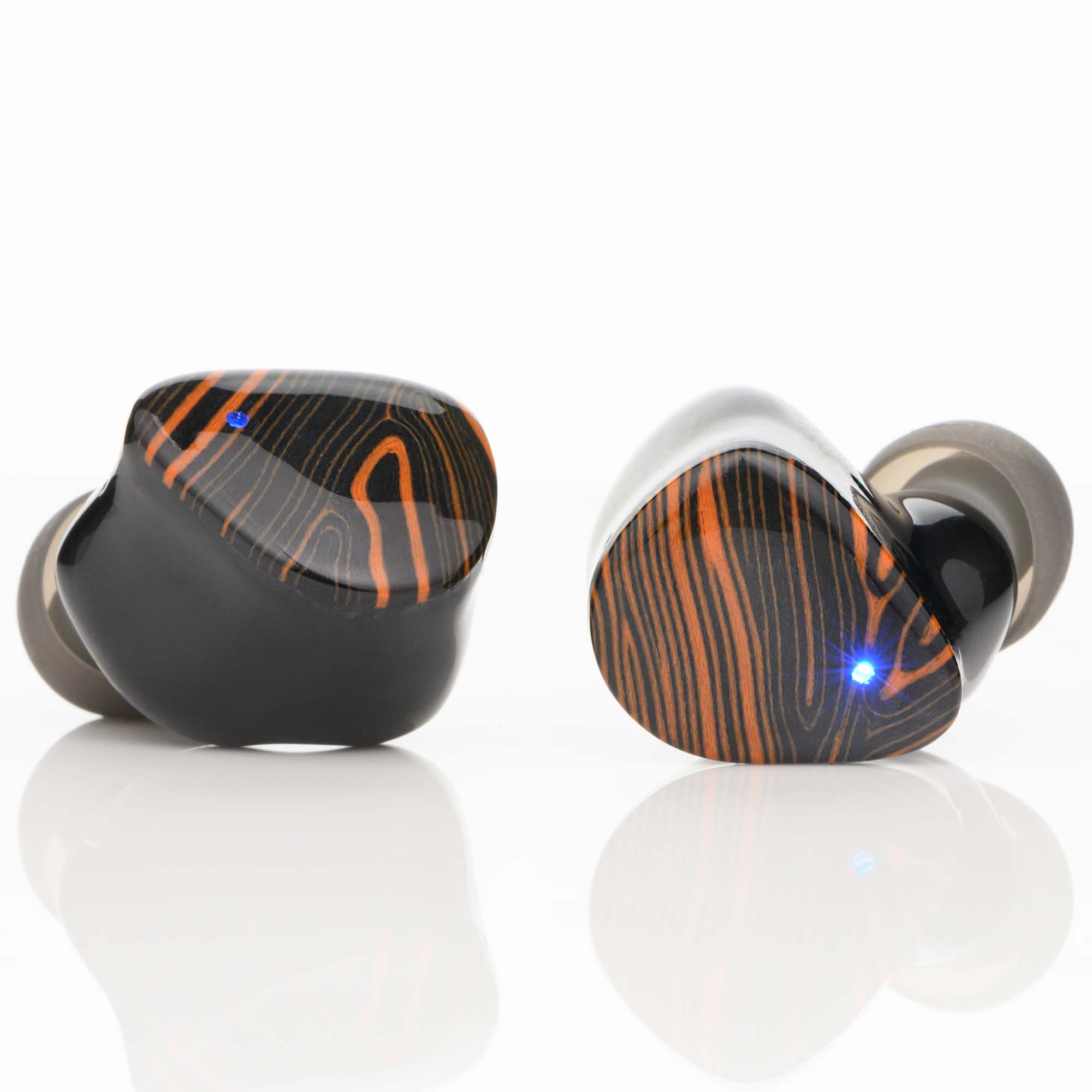 Noble Audio FoKus Triumph Wireless IEM in black with orange wood grain pattern and blue indicator lights on white background