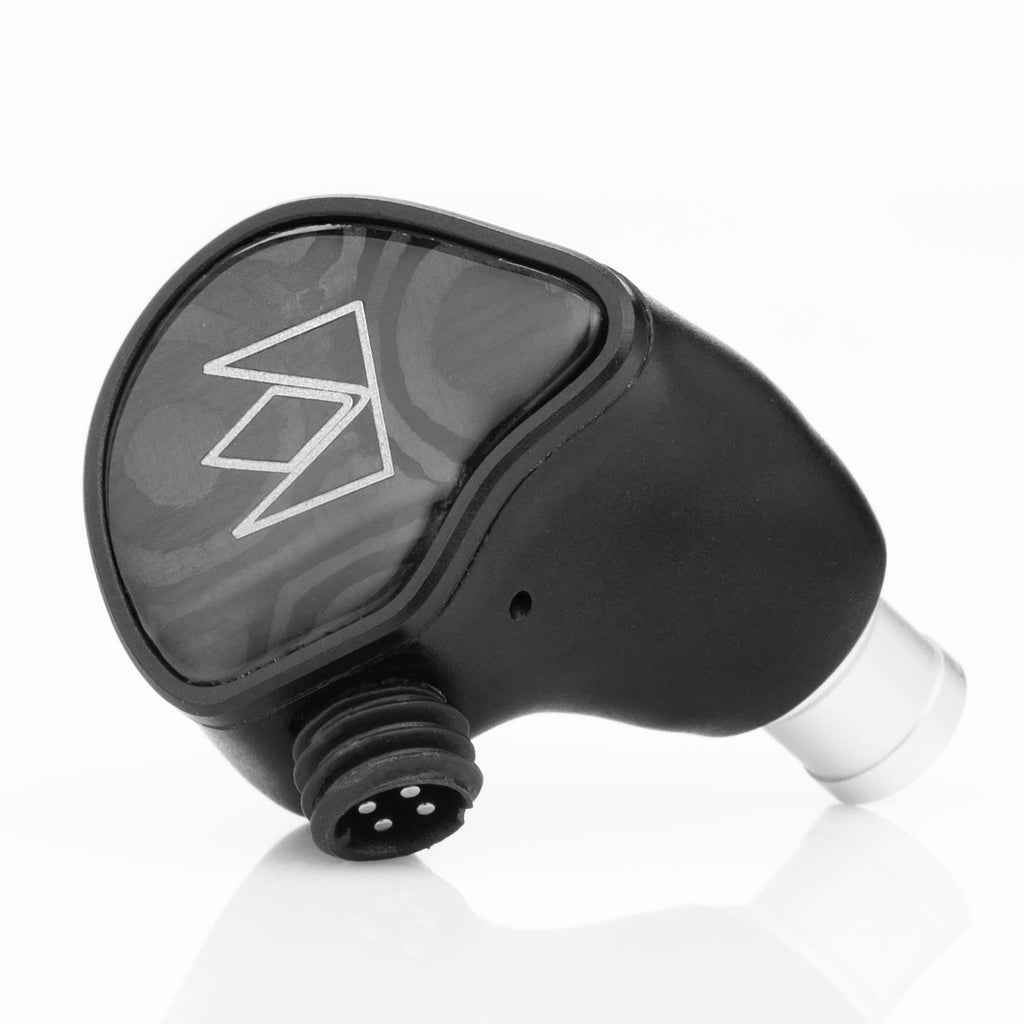 Close-up of the Noble Audio XM-1 IEM with xMEMS Driver in black with connector pins and logo on white background