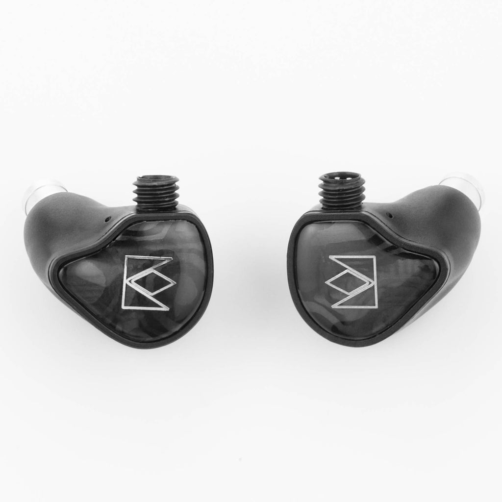 Noble Audio XM-1 IEM with xMEMS Driver black in-ear monitors with transparent faceplates on white background