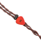 Close-up of the red cable splitter with logo on the braided cable of the Noble Audio Shogun IEM on white background