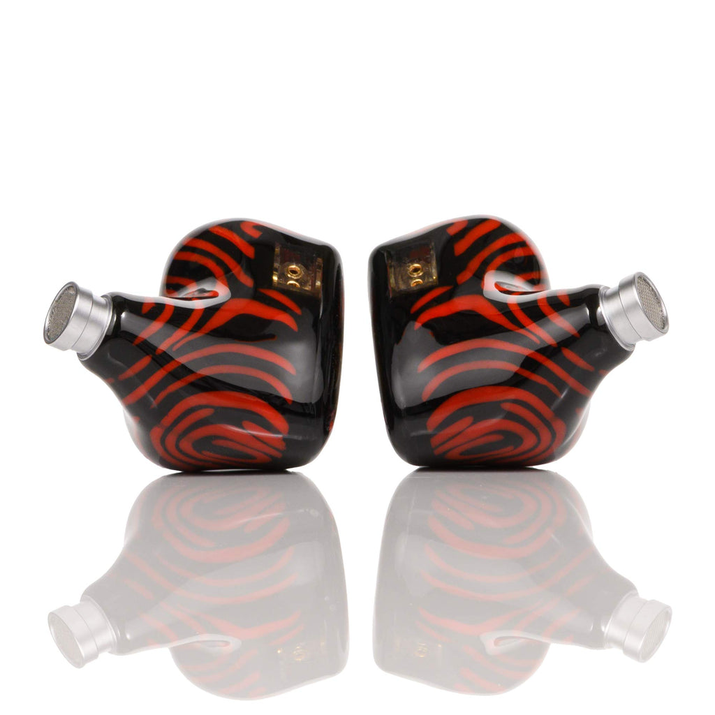 Noble Audio Shogun IEM with black and red swirl design and silver nozzle tips on white reflective surface