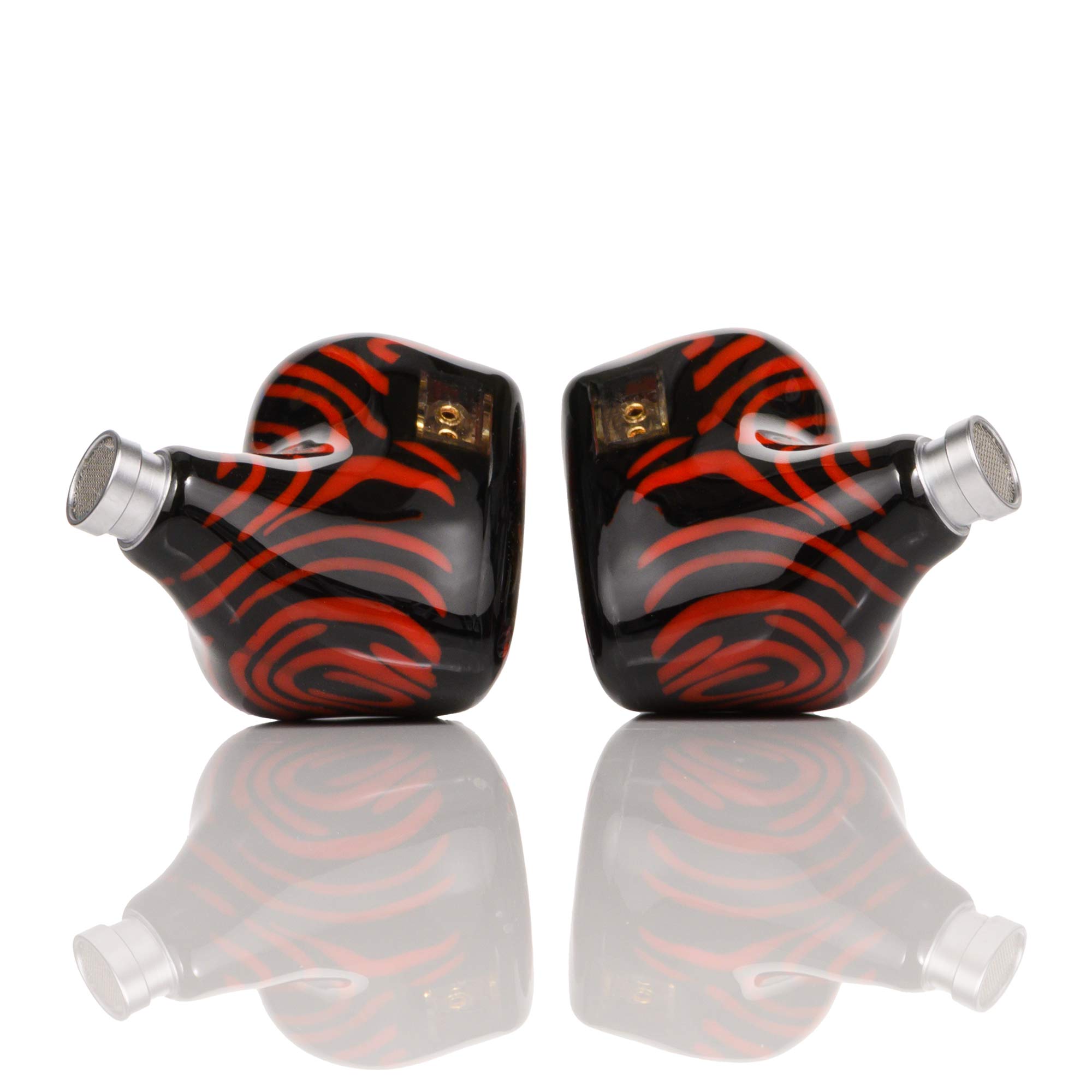 Noble Audio Shogun IEM with black and red swirl design and silver nozzle tips on white reflective surface