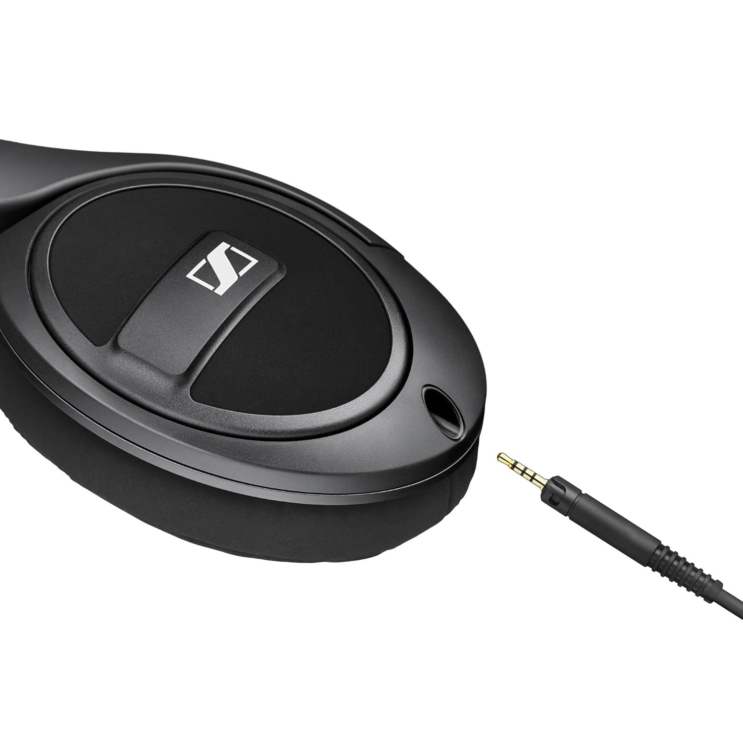 Close-up of the Sennheiser HD569 Closed-Back Headphone ear cup with detachable audio cable and plug detail