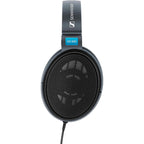 Close-up top view of Sennheiser HD600 open-back headphones with visible mesh grille and cable on white background