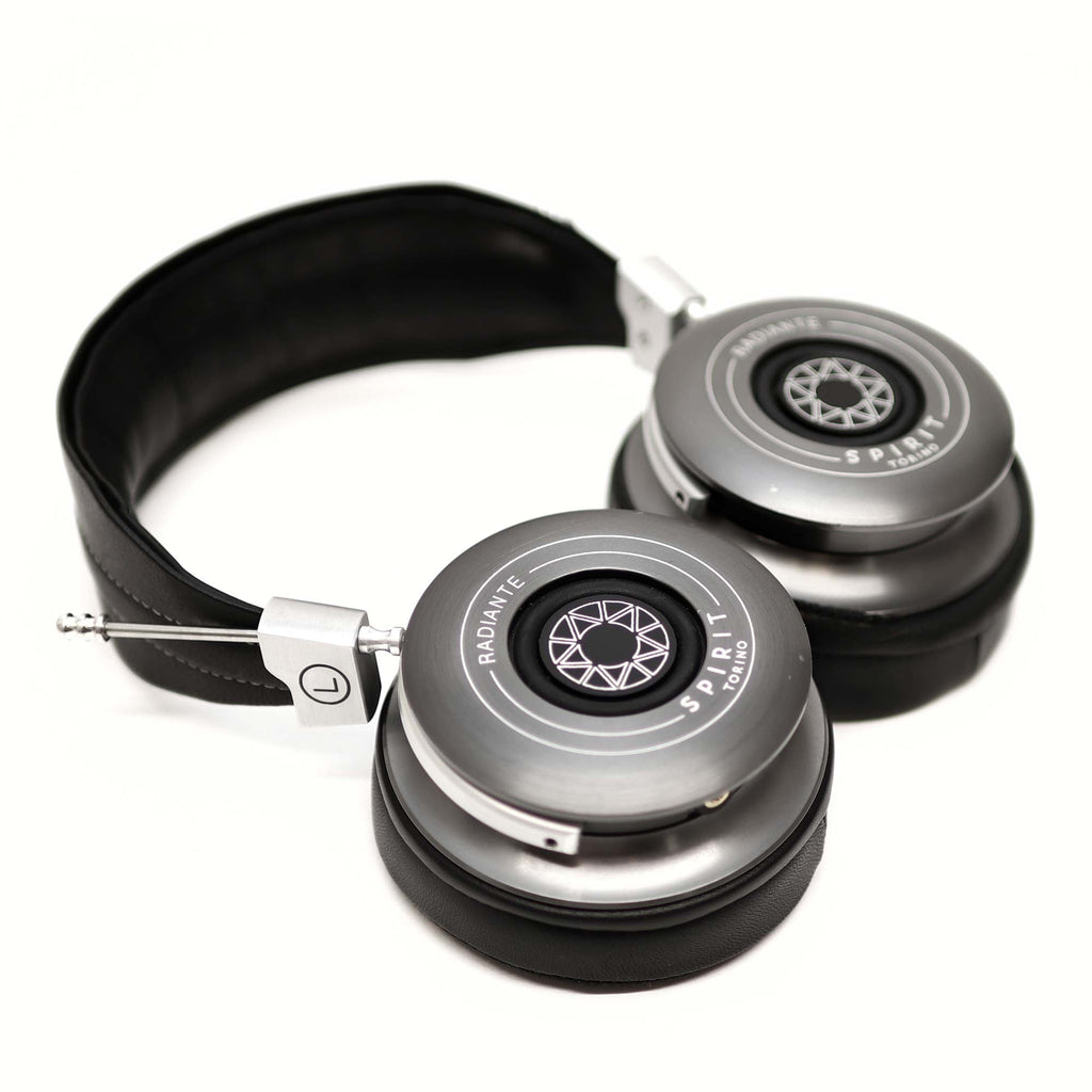 Spirit Torino Radiante Closed-Back (Pre-Owned) headphones with silver ear cups and black padded headband on white background