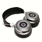 Spirit Torino Radiante Closed-Back (Pre-Owned) headphones with silver ear cups and black padded headband on white background