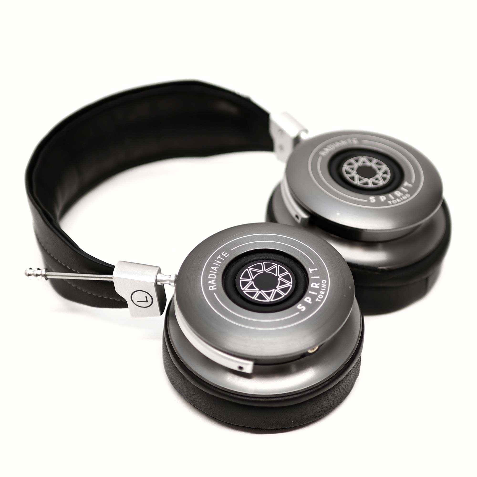 Spirit Torino Radiante Closed-Back (Pre-Owned) headphones with silver ear cups and black padded headband on white background