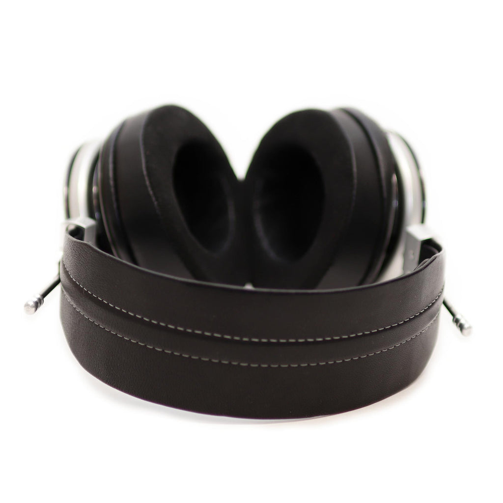 Spirit Torino Radiante Closed-Back (Pre-Owned) headphones with black ear pads and leather headband on white background