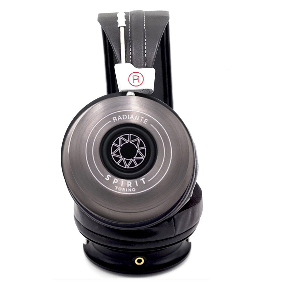 Spirit Torino Radiante Closed-Back (Pre-Owned) headphone ear cup with brushed metal finish and leather headband on white background