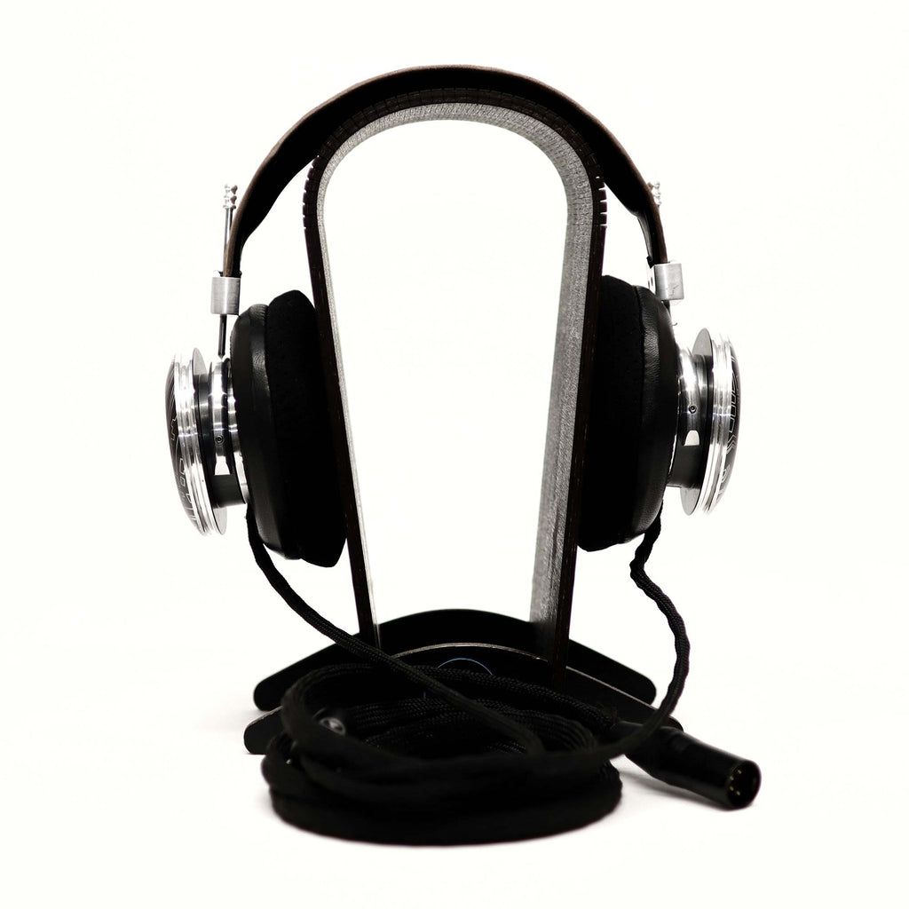 Spirit Torino Twin Pulse 1706 open back headphones with silver ear cups and detachable black cable on white background