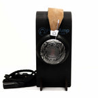 Spirit Torino Twin Pulse 1706 dynamic open back headphones with patterned ear cup and tan headband on black stand