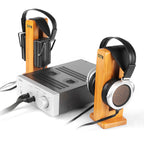 STAX SRM-700T Electrostatic Headphone Amplifier connected to two headphones on wooden stands against white background