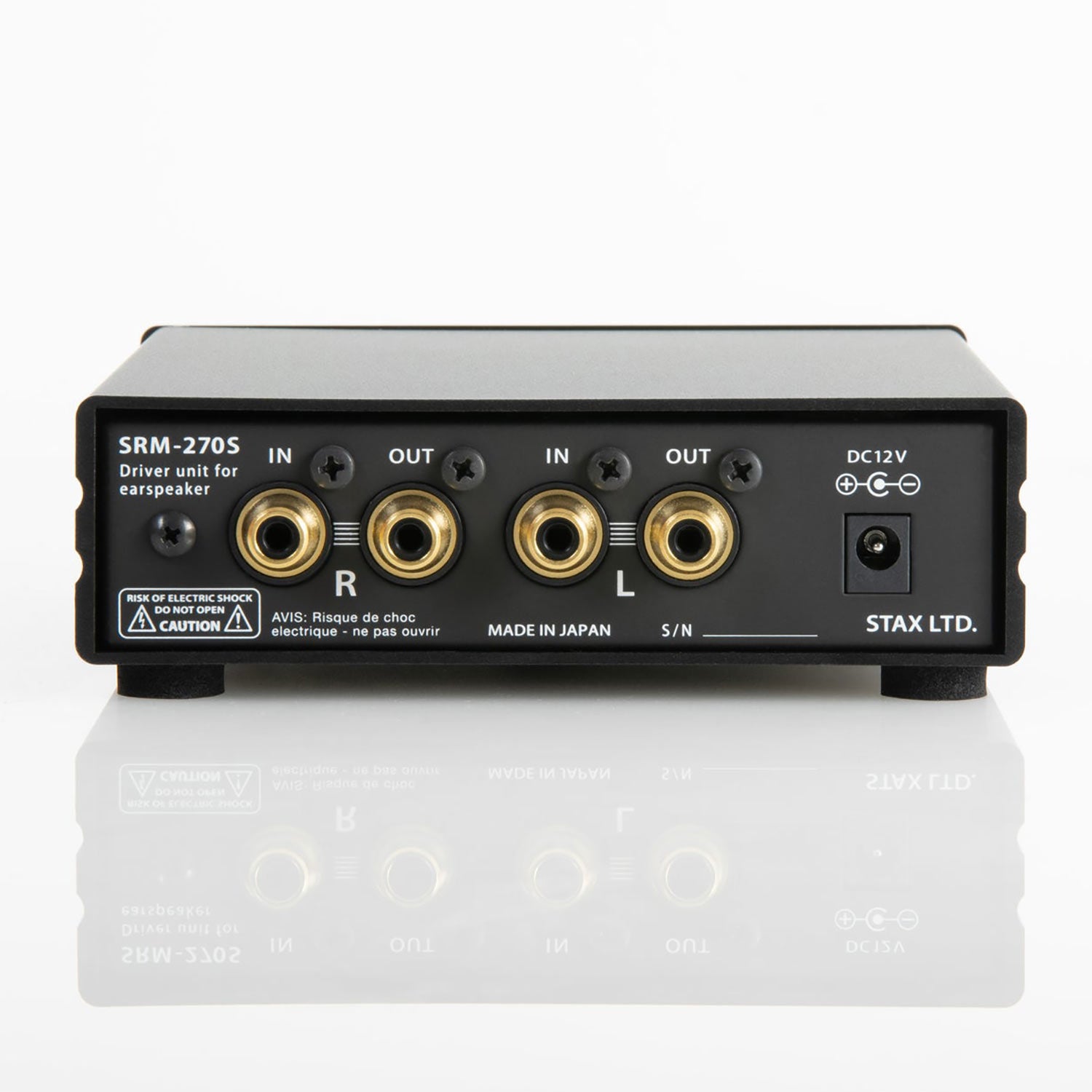 Rear view of the STAX SRS-X1000 Electrostatic Earspeaker System showing input and output RCA connectors on a white reflective surface