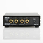 Rear view of STAX SRM-270S Electrostatic Driver Unit showing input and output RCA connectors and power port on white surface