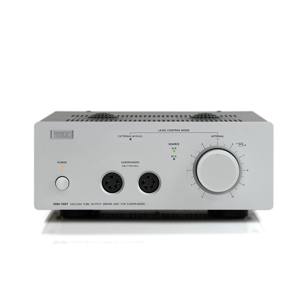 Front view of STAX SRM-700T Electrostatic Headphone Amplifier with control knob and dual output sockets on white background