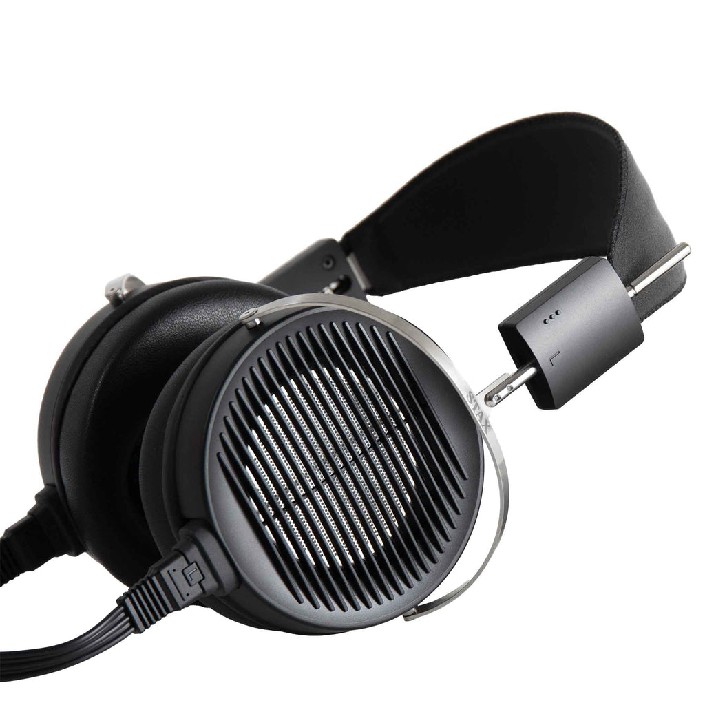 STAX SR-X1 Electrostatic Earspeaker with black open-back ear cups and metal frame on white background