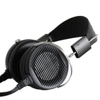 STAX SR-X1 Electrostatic Earspeaker with black open-back ear cups and metal frame on white background