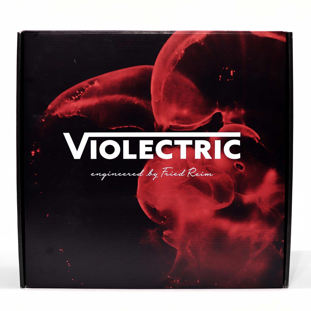 Violectric DHA V590² PRO Headphone Amplifier product box with red abstract design and white brand logo on black background