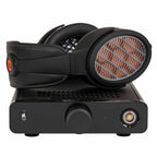 Warwick Acoustics BRAVURA Electrostatic Earspeaker System resting on its amplifier with detailed ear cups and leather headband