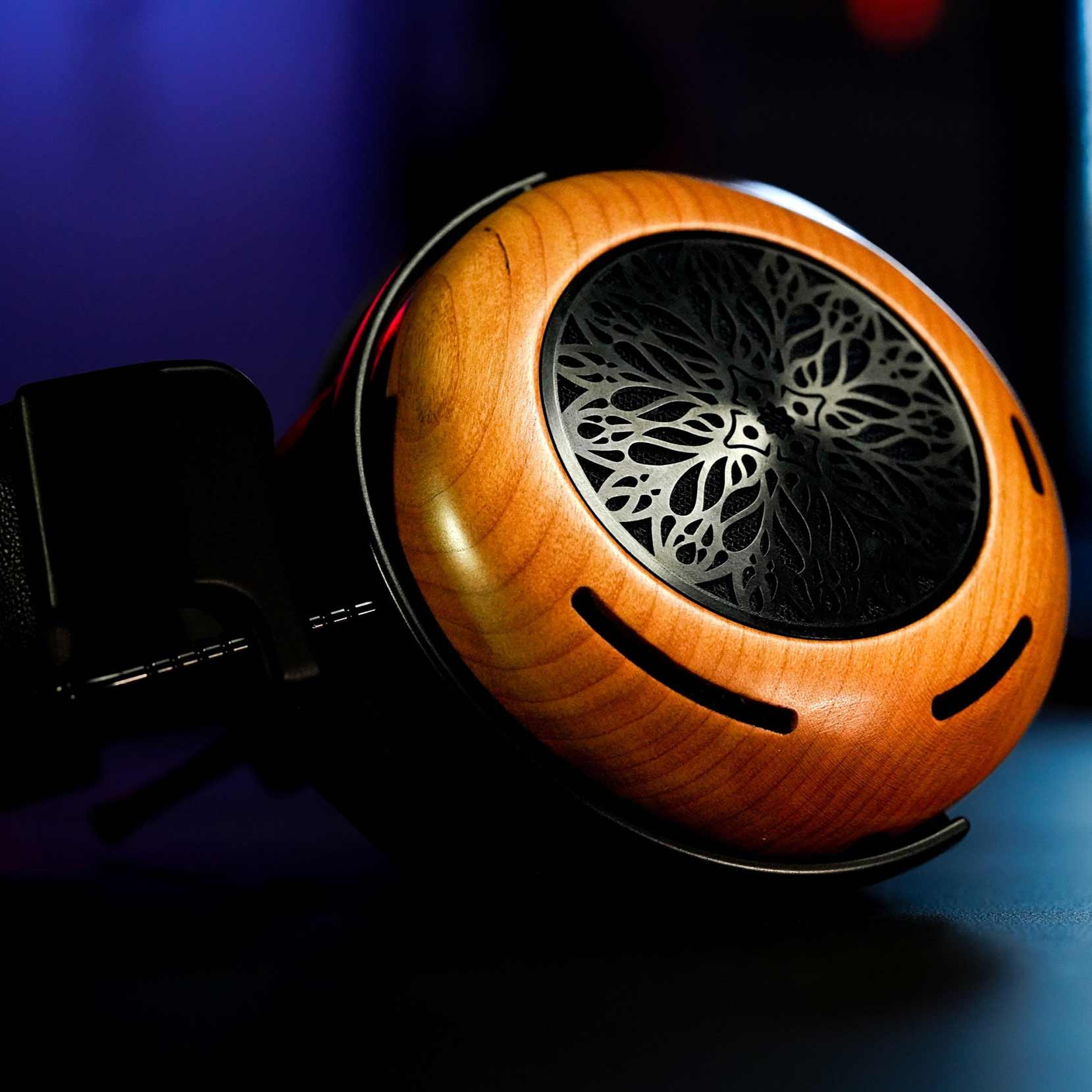 Close-up of the wooden ear cup and intricate grille of the ZMF Atrium 2024 Open-Back with Magnesium Upgrade (Pre-Owned)