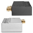 Side view of two Chord 2yu Music Streamer units in black and silver with gold audio connectors on white background