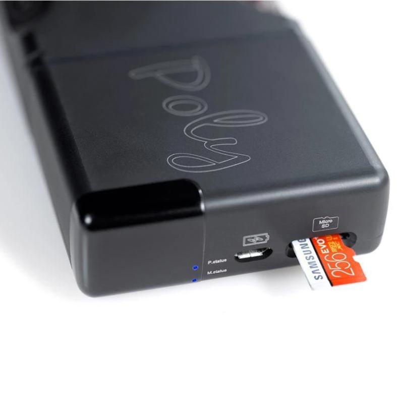 Close-up of Chord Poly Wireless Music Streamer with microSD card slot and status indicator lights on white background