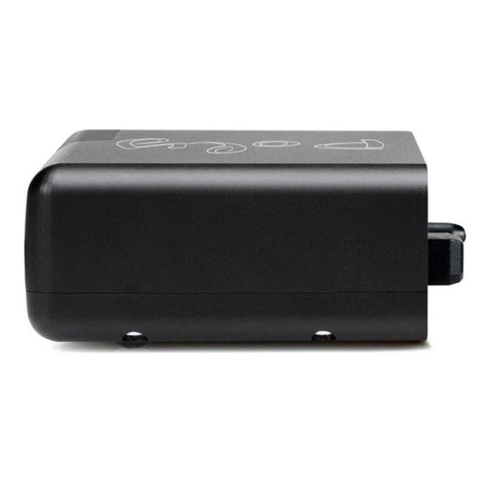 Side view of the black Chord Poly Wireless Music Streamer with rounded edges on a white background