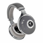 Focal Clear Open-Back Dynamic Headphones angled view showing perforated ear pads and metallic grille design on white background