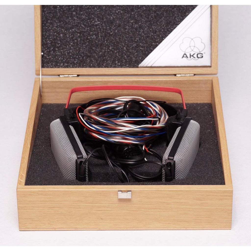 AKG K1000 headphones with original wooden storage box and coiled multicolor cable inside on white background
