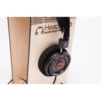 Grado HF-1 Limited Edition Headphone in black on wooden headphone stand against white background