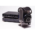 Sony Qualia 010 Reference Headphone with blue earpieces on a stand beside a dual-mono headphone amplifier unit