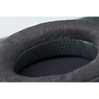 Close-up of black HIFIMAN FocusPads earpad with soft velour and perforated synthetic leather interior surface