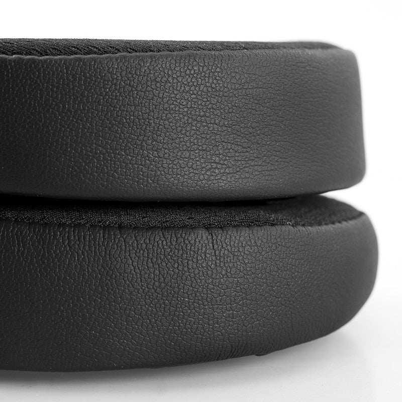 Close-up of black HIFIMAN Harmony Pads (Replacement Earpads for Susvara Headphones) with textured surface on white background