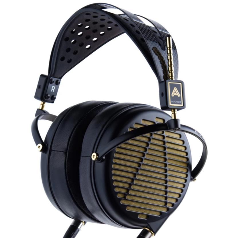 Audeze LCD-4z open-back planar magnetic headphones with gold grille and black leather ear pads on white background
