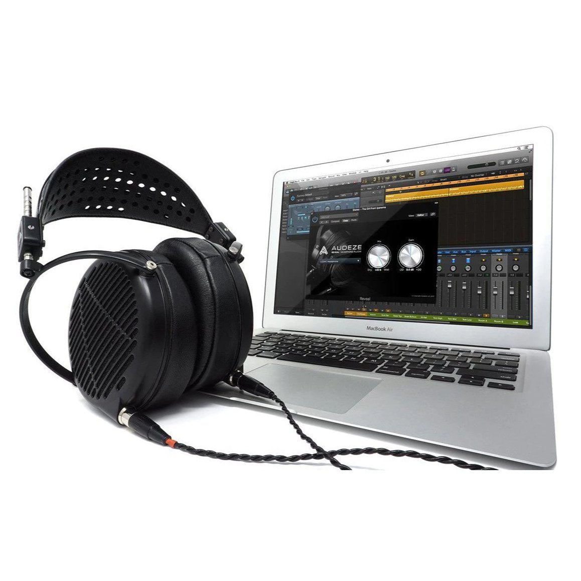 Audeze LCD-MX4 planar magnetic headphones connected to a laptop running audio software with detailed interface.
