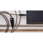 Meze 99 Series OFC Balanced Upgrade Headphone Cable connected to device with visible Meze Audio logo on black connector