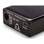 Close-up of HeadAmp Pico Portable Headphone Amplifier USB input and 12V DC adapter port on black metal casing